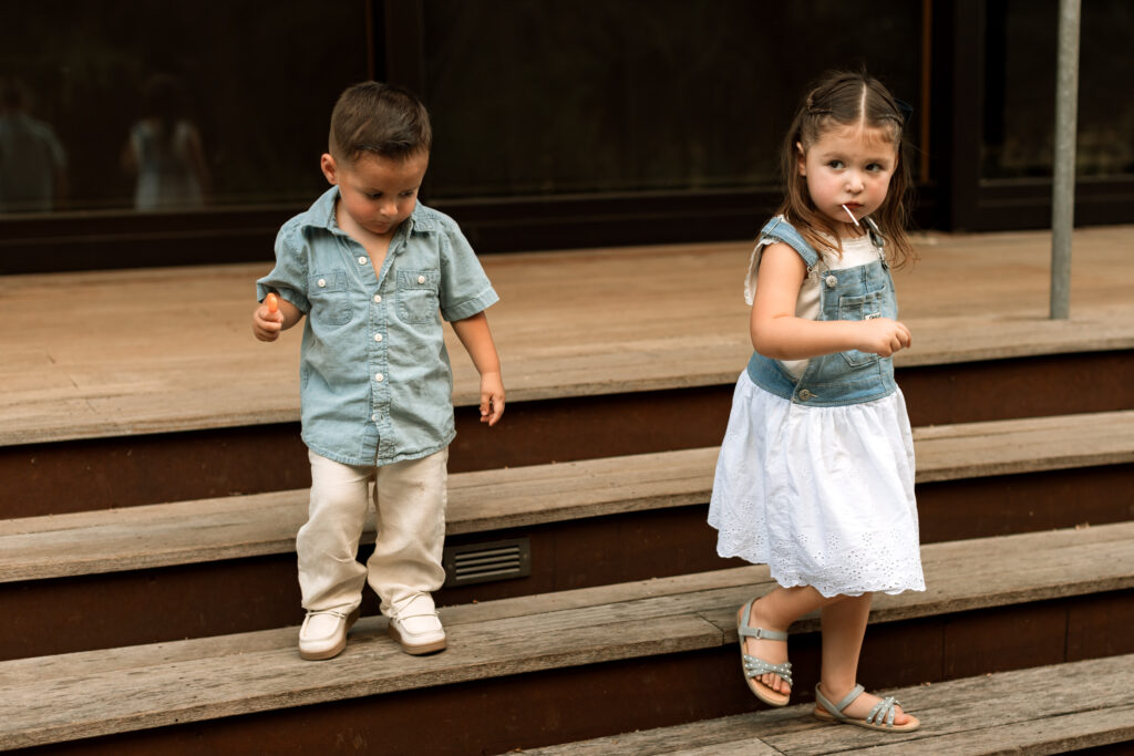 kids eating lollipops during photo session